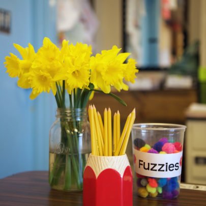 Flowers, pencils, and fuzzies school supplies