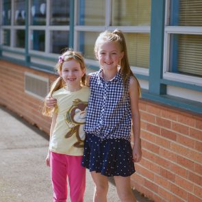 Two students posing together